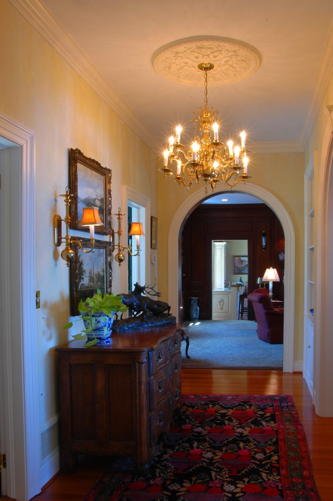 Gorgeous Side Hall. Exquisite moldings and architectural details.