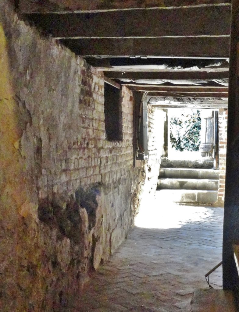 2012 Renovation Root Cellar after photo - bog iron under English bond brick